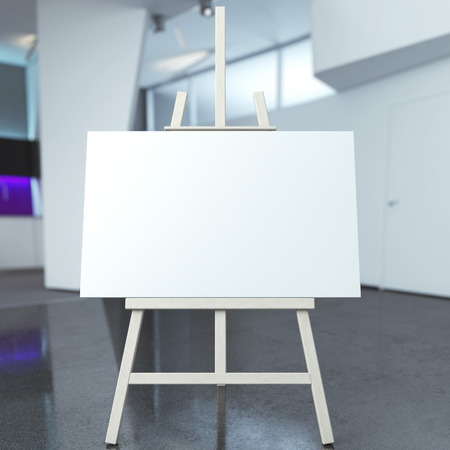 easel with empty canvas in modern interiorの写真素材