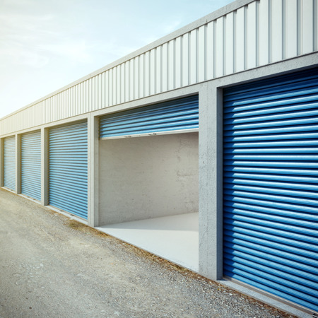 Empty storage unit with opened door Empty storage unit with opened door