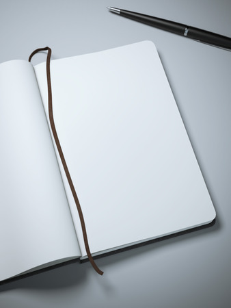 Notebook with clear pages and penの写真素材