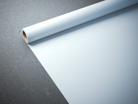White paper roll on the concrete floorの写真素材