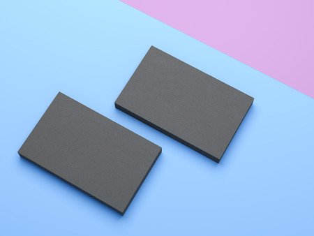 Two black business cards on the blue background