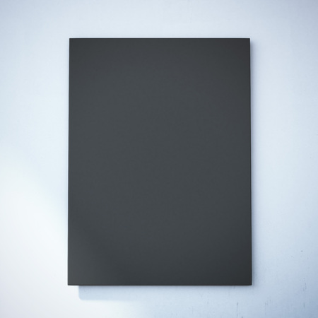Blank black canvas on the white wall. 3d renderingの写真素材