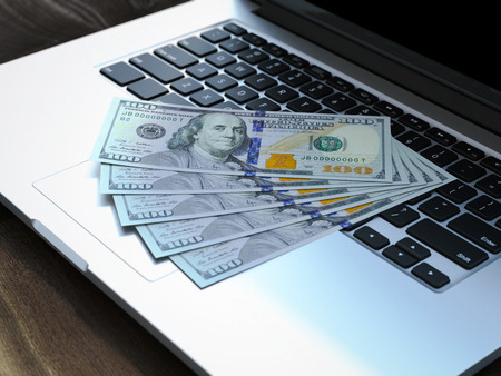 Five hundred dollars on modern laptop keyboard. 3d renderingの写真素材