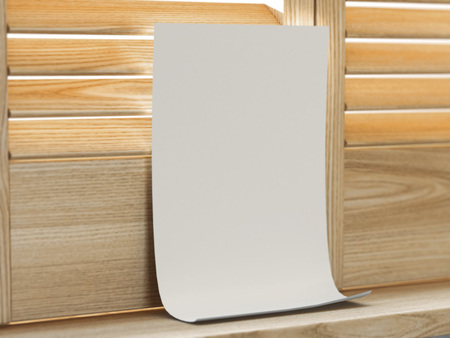 White paper sheet near window with wooden shutters. 3d renderingの写真素材