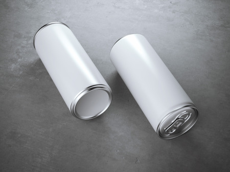Two blank white aluminium cans on concrete floorの写真素材
