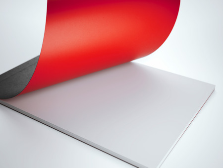 Blank black notepad with white pages in white studioの写真素材