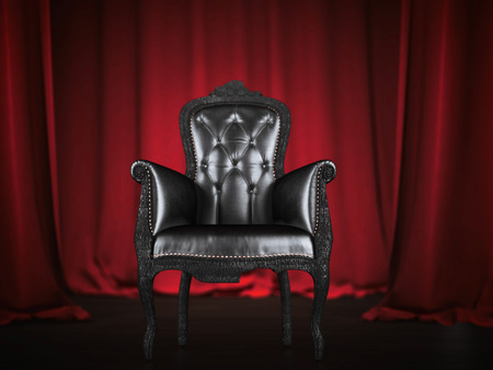 Luxury leather armchair and red curtains on the stage. 3d renderingの写真素材