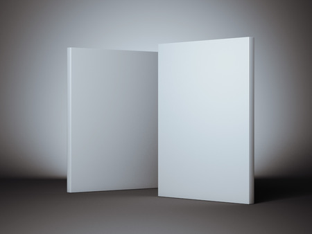 Two white boxes in dark studio. 3d renderingの写真素材
