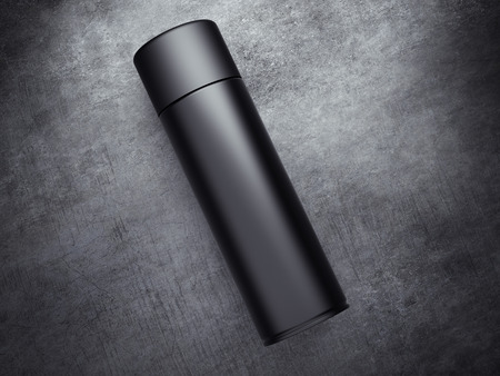 Black spray can on the concrete floor. 3d renderingの写真素材