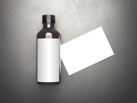 Brown bottle with blank business card on gray floor. 3d renderingの写真素材