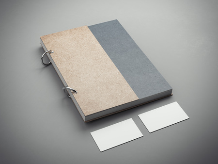 Notebook with two blank business cards. 3d renderingの写真素材