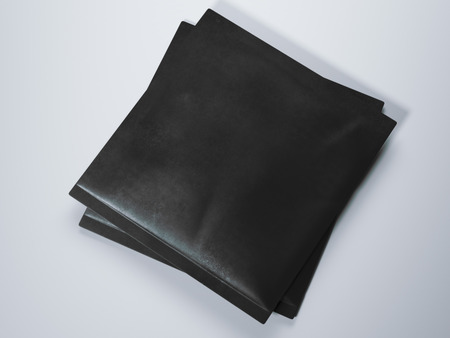 Two black packaging on the white floor. 3d renderingの写真素材