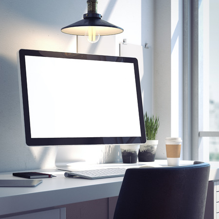 Workspace with silver modern computer on the desk. 3d renderingの写真素材
