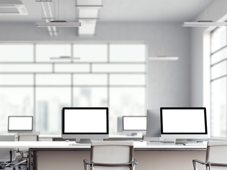 Office interior with multiple blank computer screens. 3d renderingの写真素材