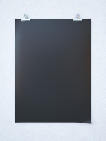 Black blank sheet of paper on bright wall. 3d renderingの写真素材