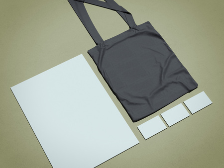 Business mock up with black cotton bag on a green floor. 3d renderingの写真素材