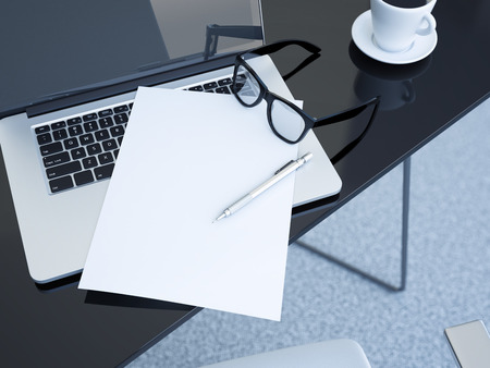 Office table with modern laptop and white paper sheet. 3d renderingの写真素材
