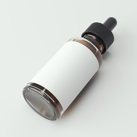 White glass bottle with brown liquid on a bright background. 3d renderingの写真素材