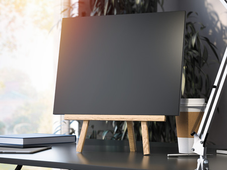 Wooden small easel with blank frame. 3d renderingの写真素材