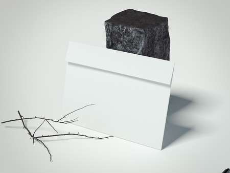 White envelope near dark stone in modern studio. 3d renderingの写真素材