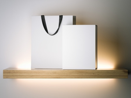 White shopping bag and box on the shelf. 3d renderingの写真素材