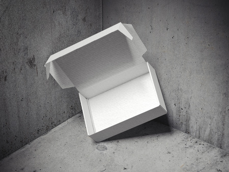 White opened package in concrete corner. 3d renderingの写真素材