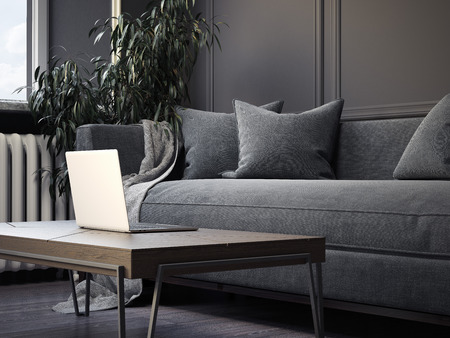 Gray interior with table and silver laptop. 3d renderingの写真素材