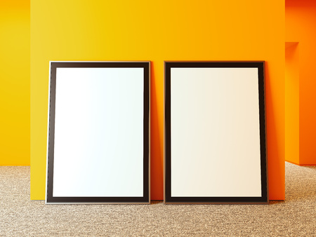 Blank billboards with black frame next to orange walls, 3d renderingの写真素材