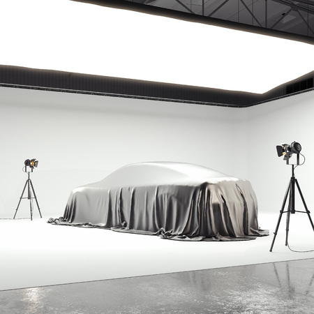 Photographic studio with covered car and several light sources. 3d renderingの写真素材