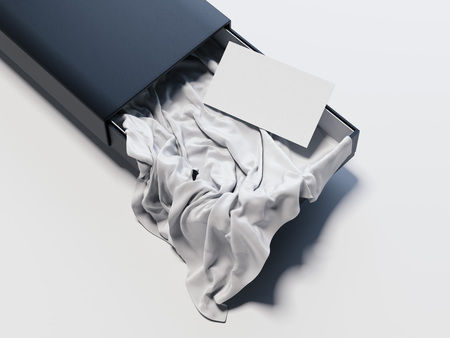 Opened black cardboard box with tissue and business card inside, 3d rendering.の写真素材