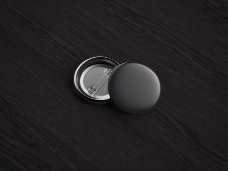 Black pin buttons on dark wooden background, 3d rendering.の写真素材