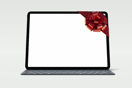 Black modern laptop with with gift bow on blank screen. 3d rendering.の写真素材