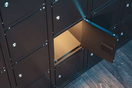 Safe deposit boxes with switched-on light. Safety closets. 3d renderingの写真素材