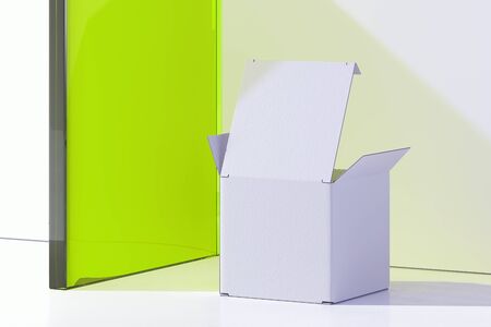 Isolated white realistic cardboard box on white background. 3d rendering.の写真素材