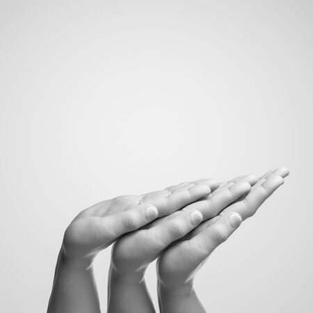 Realistic white human hands with empty space as showcase isolated on white background. 3d renderingの写真素材