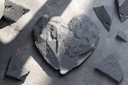 Heart Made Of Concrete Or Stone Near Stone Fragments. 3d Rendering.