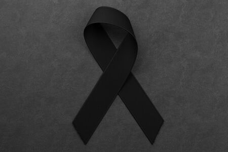 Black Awareness Ribbon on Black Background. Mourning and Melanoma Solidarity Symbol. 3d renderingの写真素材