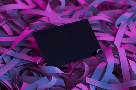 Black Blank Business Card On Violet Illuminated Ribbons. 3d Rendering. Copy Space. Empty Space.の写真素材