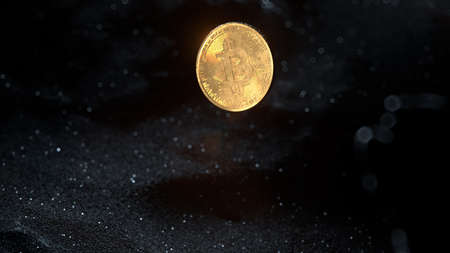 Bitcoin mining concept. A gold coin rises and shines from under the thickness of black sand. High depth of field 3d renderingの写真素材