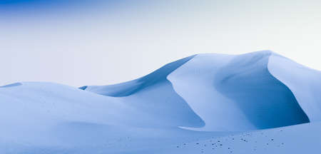 Blue dunes and bright sky. Desert dunes landscape with contrast skies. Minimal abstract background. 3d renderingの写真素材