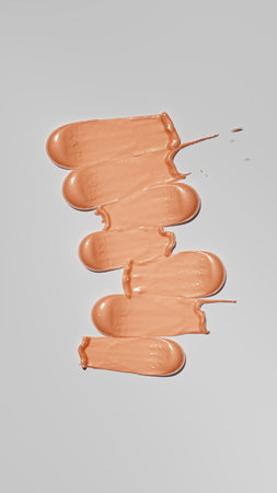 Beige cosmetic face cream texture. Lotion smear isolated on white background. Beauty skincare product swatch. high quality 3d illustrationの写真素材