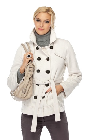 blonde woman in coat isolated on whiteの写真素材