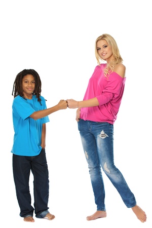 cute blonde woman with her young rasta brother in studioの写真素材