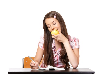 nice woman learning and eating appleの写真素材