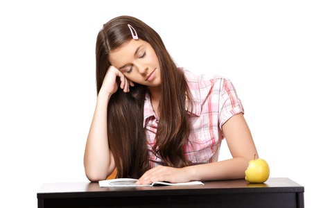 cute student dreaming in schoolの写真素材