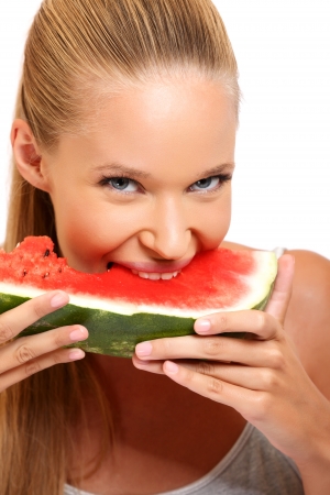 nice blonde woman with fruits isolated on whiteの写真素材