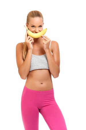 nice blonde woman with fruit isolated on whiteの写真素材