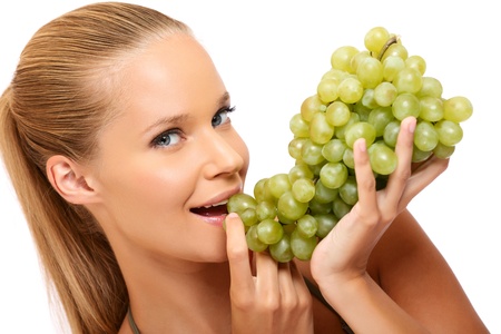 nice blonde woman with fruit isolated on whiteの写真素材