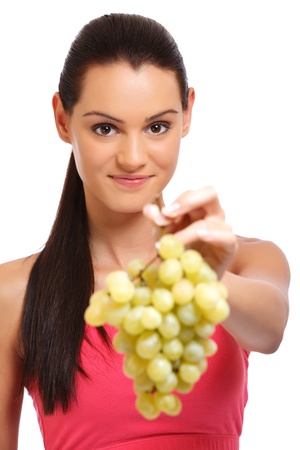 cute teenager with fruit isolated on whiteの写真素材