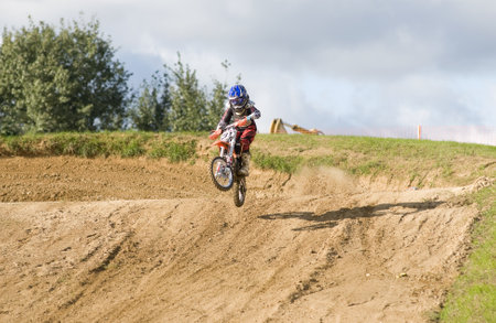 MOSCOW-SEPTEMBER 8: Zhmylev Dmitry (command Gallaks DOSAAF Mytishchi) in the Stage III Cup XSR-MOTO.RU Cross Country in Moscow, Sheremetyevo, motostadion のeditorial素材